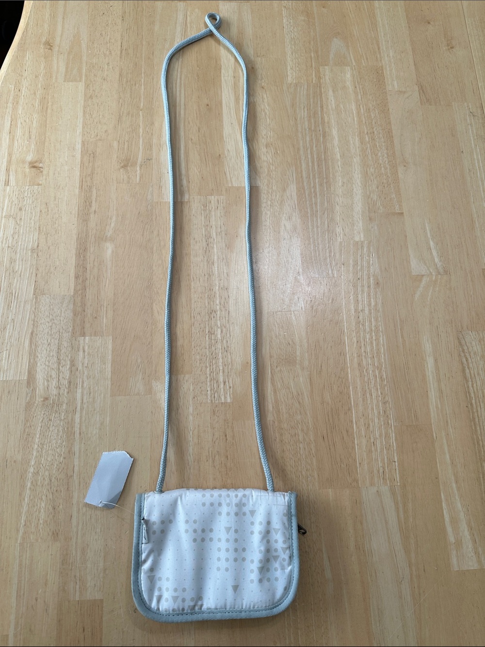 Eddie Bauer Light Gray Patterned Crossbody wallet